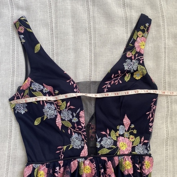 GB formal gown in navy with embroidered pink, yellow, and blue flowers. - Picture 14 of 15